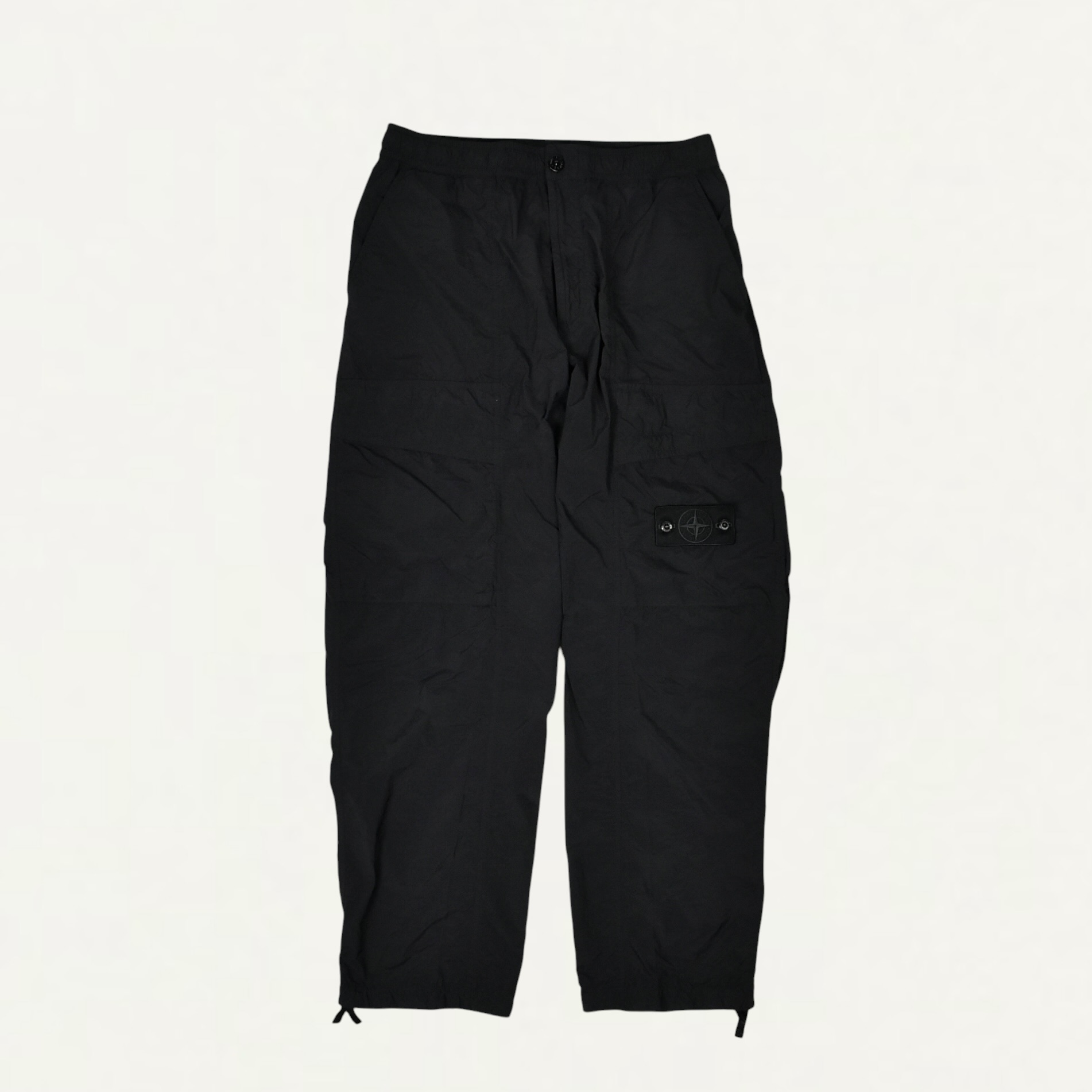STONE ISLAND 3100026 NYLON SMERIGLIATO_S.I. GHOST Loose-fit cargo trousers with snap pockets Black[L2S153100026S00F6]
